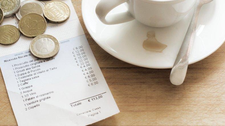 Some coins on a receipt