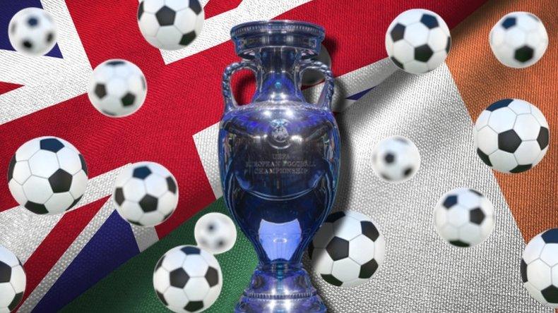 Uefa Euro trophy in front of Ireland and UK flags