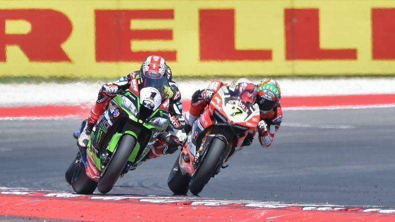 British Rider Jonathan Rea (1) of Kawasaki Racing Team competes with British rider Chaz Davies (7) of Aruba racing for Ducati during the race 1 of 2017 FIM World Superbike Championships at the world circuit Simoncelli in Misano, Italy