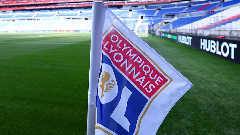 A corner flag with the badge of Lyon pictured at the Parc Olympique Lyonnais
