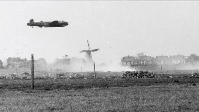 Archive photo of a Lancaster Bomber flying low over The Netherlands.
