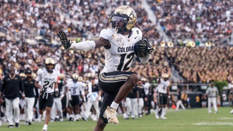 Travis Hunter celebrates an interception for Colorado against Central Florida