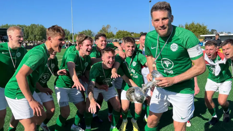 Guernsey captain Ross Allen celebrates with the rest of his team after winning the 2025 Muratti Vase.