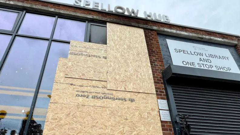 Spellow Library Hub - camera points upwards showing a boarded-up front window