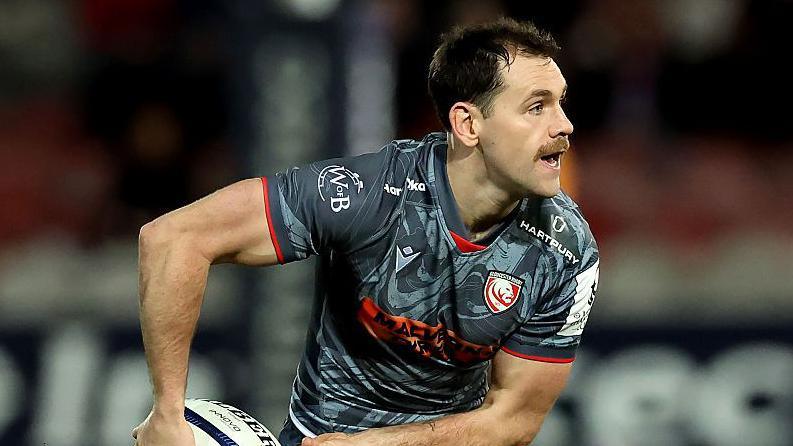 Gloucester scrum-half Tomos Williams shapes to pass the ball