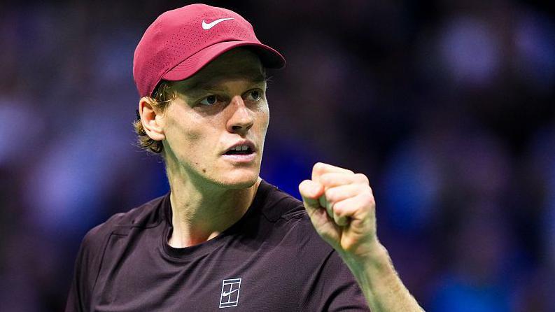 Jannik Sinner clenches his fist during his win over Ben Shelton at the Paris Masters in 2024