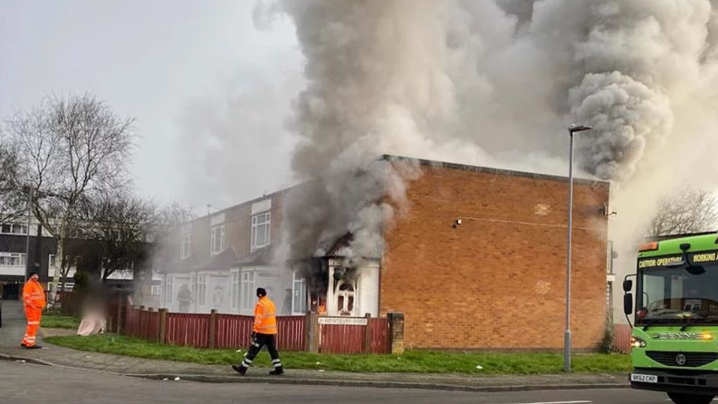 Plumes of smoke rising from the maisonette