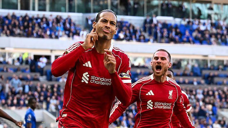 Van Dijk celebrates scoring against Everton