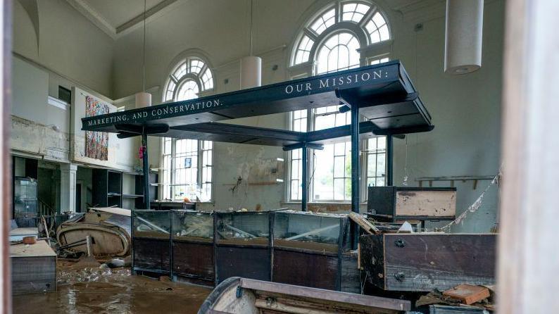 Flood damage inside a building in the Biltmore Village, in Asheville, North Carolina