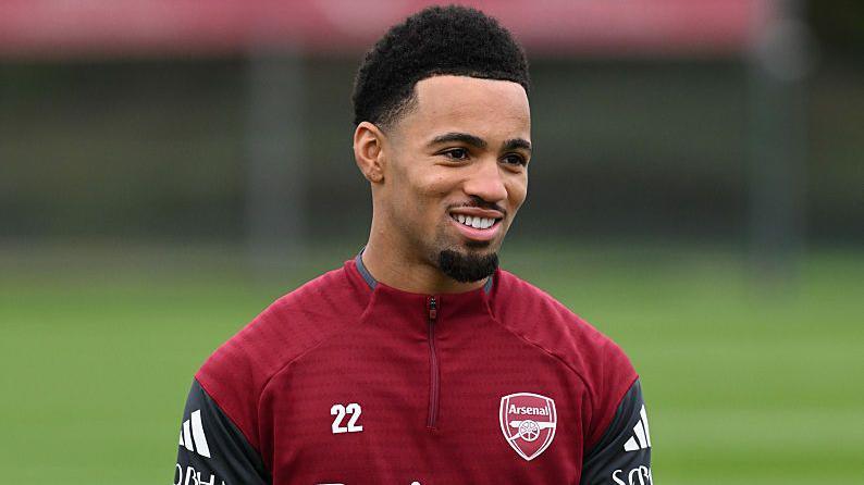 Ethan Nwaneri smiles during a training session for Arsenal