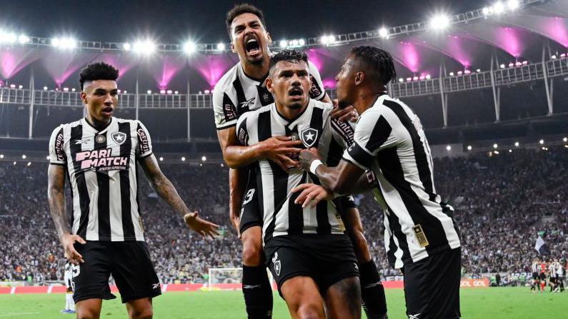 Botafogo players celebrate scoring
