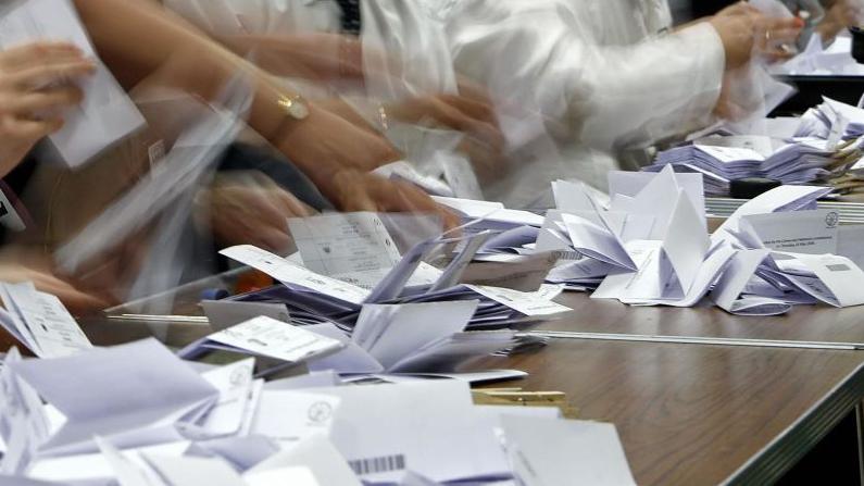 people counting votes