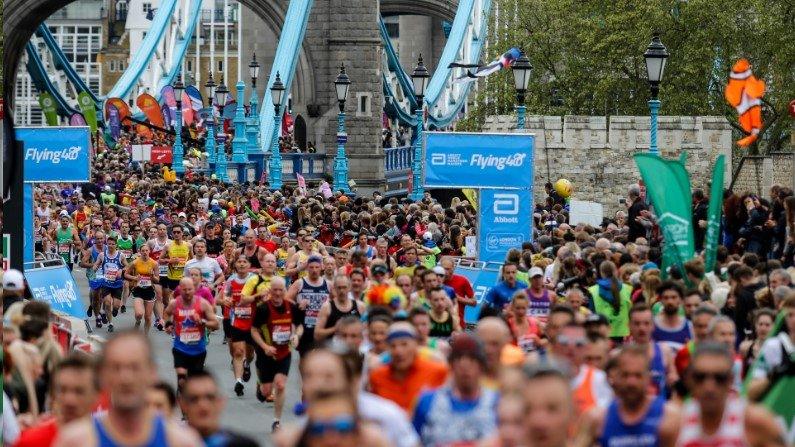 Runners heading over Tower Bridge in the 2019 London Marathon