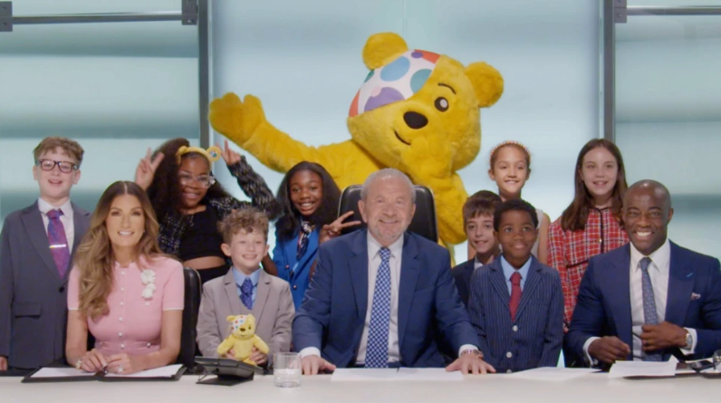 Pudsey Bear with Lord Sugar and mini Apprentices.