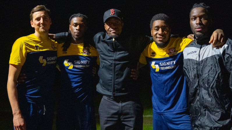 Wilfried Zaha (centre) pictured at Camberley Town with AFC Croydon Athletic players Tom Collins, Richard Pingling, Brandon Pierrick and Jerry Amoo