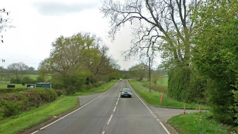 The entrance to a farm on a rural road