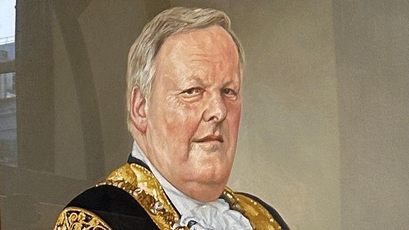 The portrait of former Belfast Lord Mayor Lord Browne on display inside Belfast City Hall.