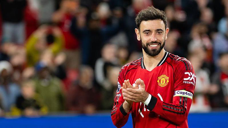 Bruno Fernandes applauding for Manchester United