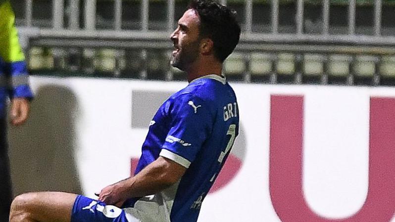 Will Grigg of Chesterfield celebrates scoring