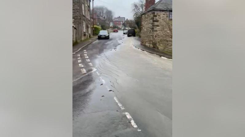 Water coming down Church Street in Fritchley