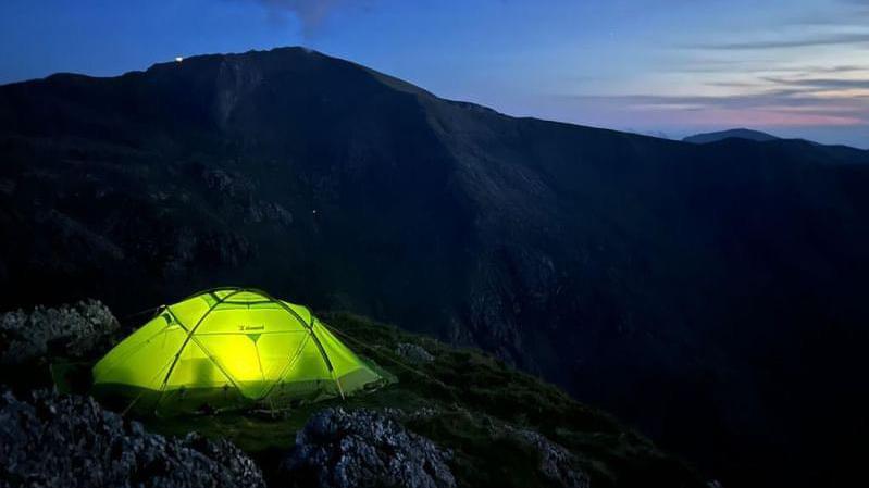 Tent lit up as darkness falls