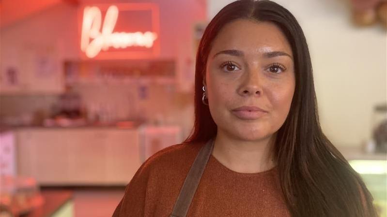 Close up of Sami Bristow in her coffee shop in Godstone