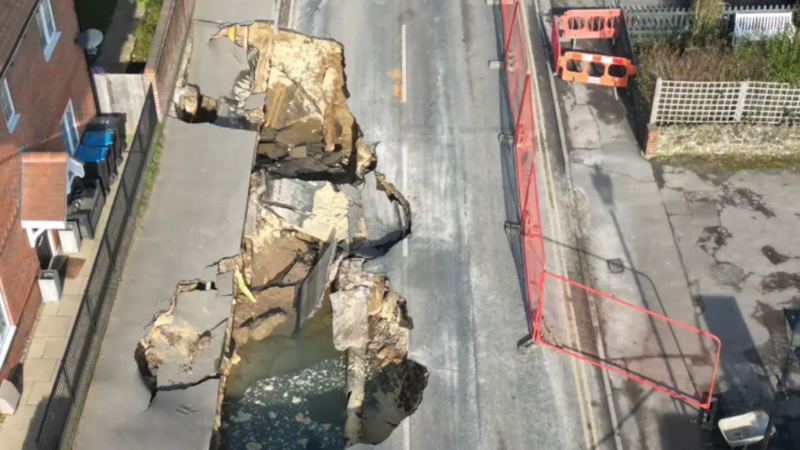 Giant sinkhole linked to burst water main