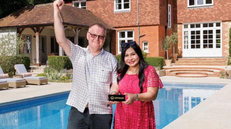 Former milkman wins £4m mansion in prize draw