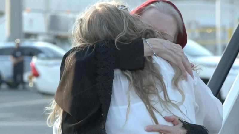 Watch: Hugs on tarmac as family reunite after Afghan ordeal