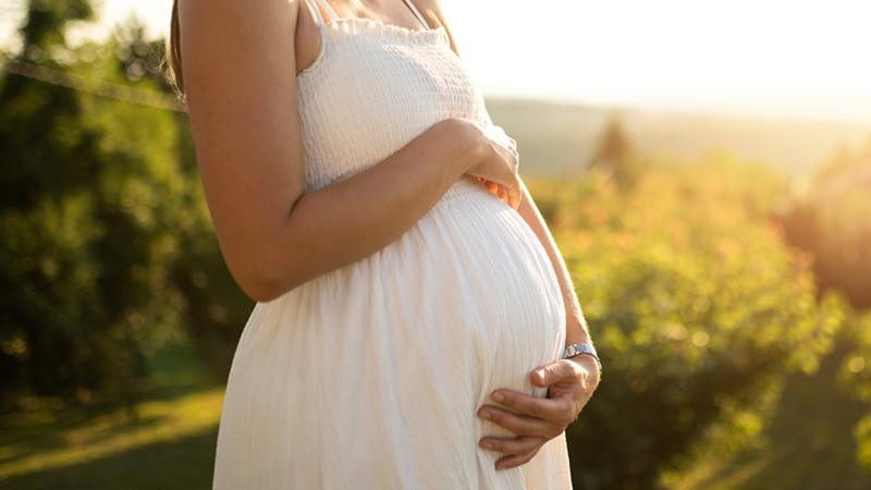 beautiful young pregnant girl in blu HighQuality People Images beautiful young pregnant girl in blu HighQuality People Images