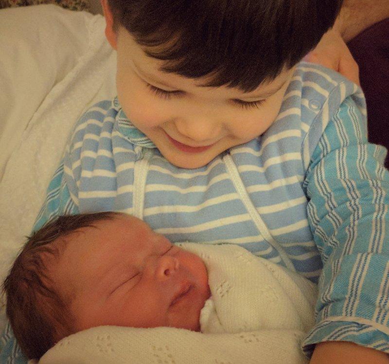 Edward, 2, meeting Margot Louisa Mary after she was born on Valentine's Day this year. "To say he was besotted is an understatement," their mum said