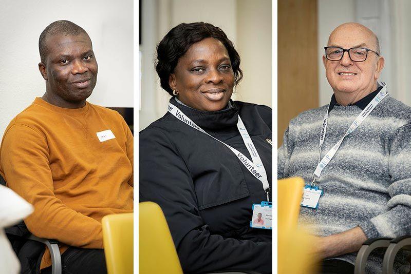 A composite image of two men and a woman. All three are sitting down and smiling at the camera. The man on the left is wearing an orange jumper and has a shaved head. A woman in the centre has black hair tied back and is wearing a black jumper with a Volunteer lanyard round her neck. The man on the right wears a striped grey and white jumper, a black shirt underneath and a similar lanyard. He has white hair and black-framed glasses.