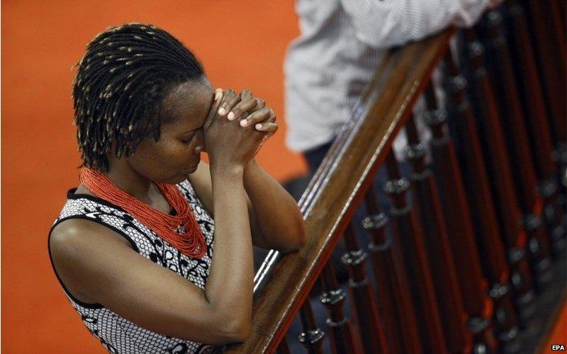 Parishioners pray inside the Emanuel African Methodist Episcopal (AME) Church in Charleston, South Carolina, USA, 21 June 2015.