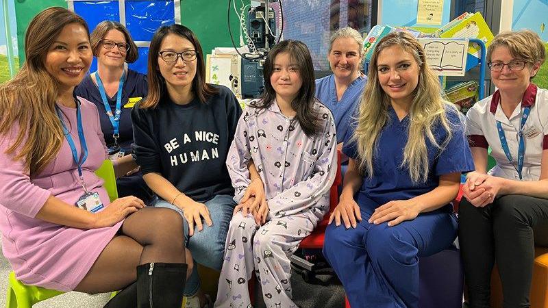 Kai with mum Ning and staff at the Royal Stoke 