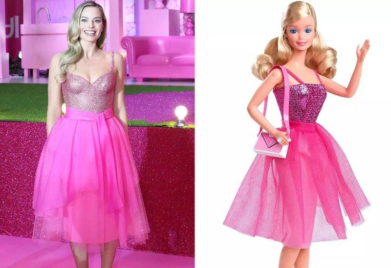 Margot dressed as Barbie, alongside the Barbie doll