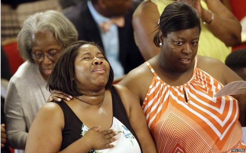 Parishioners sing during services at the Emanuel African Methodist Episcopal Church in Charleston, South Carolina, June 21, 2015