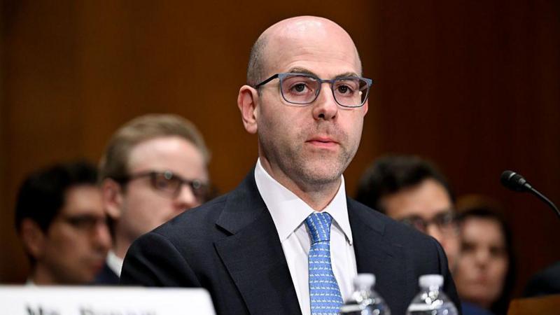 Trump's Fed pick says he will keep White House job