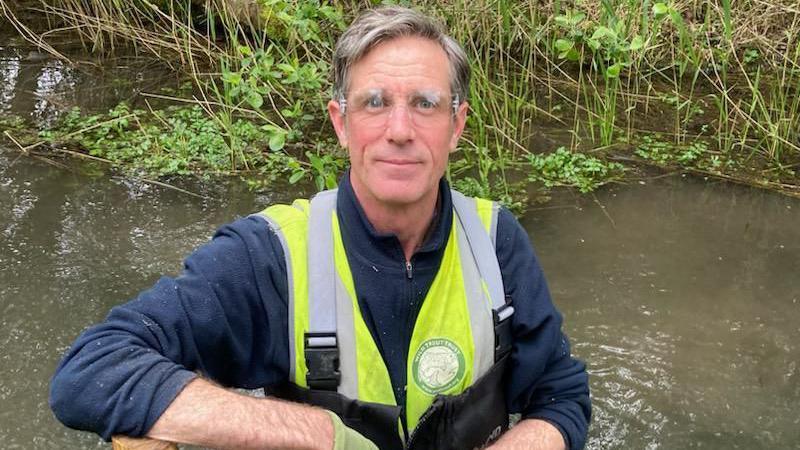 Rob Mungovan standing in The River Shep