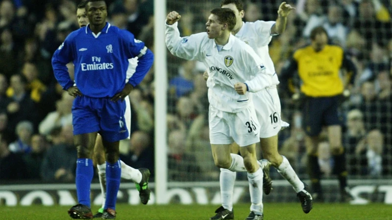 A 16-year-old James Milner celebrates scoring for Leeds against Chelsea in 2002