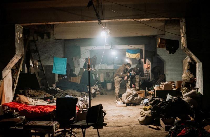 Interior of a dark bunker in Mariupol