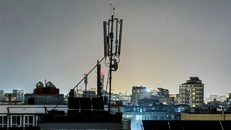 A general view shows a telecommunications antenna installed for internet services on the rooftop of a house in Kabul