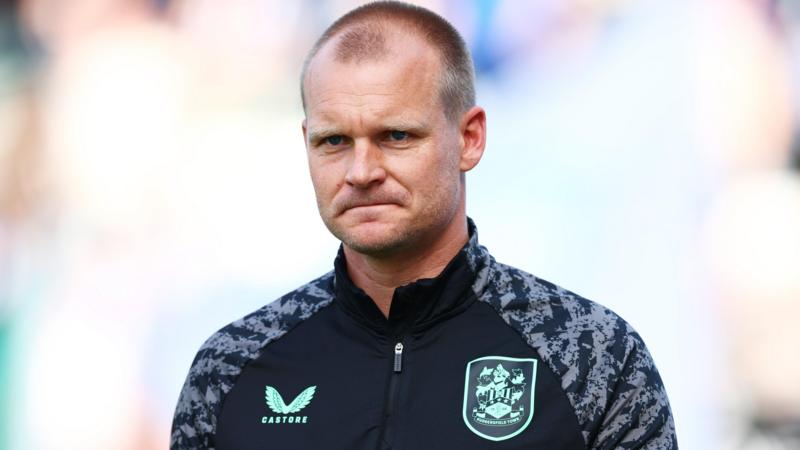 Huddersfield boss Manning leaves League One club after compassionate leave