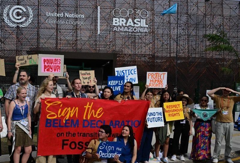 Climate activists take part in a demonstration during the COP30 UN Climate Change Conference.