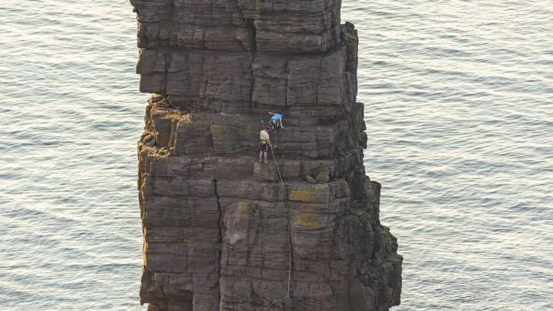 Aden Thurlow on his climb of a rocky sea stack on Scotland's Sutherland coast