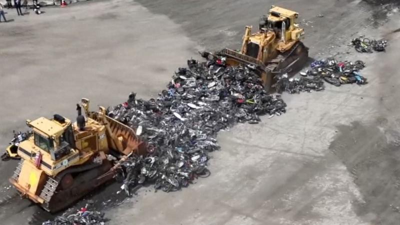 Hundreds of illegal motorbikes bulldozed in New York City crime crackdown