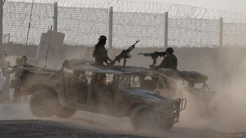 Palestinians flee IDF attacks on Gaza City as Israelis protest occupation plan