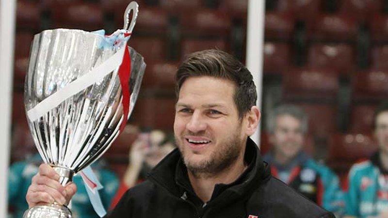 Belfast Giants coach Adam Keefe holds the Challenge Cup