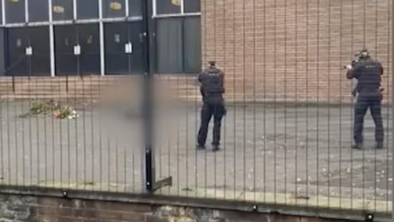 Watch: 'Get back, get back' - armed police at the scene