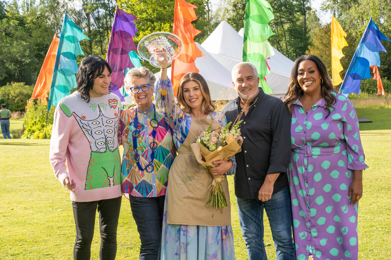 Georgie with the Great British Bake Off judges and hosts. 