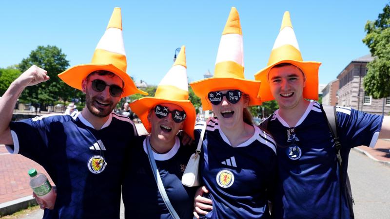Traffic cones appear on Boston statues after Scottish fans arrive in city